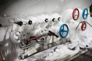 series of valves covered in ice